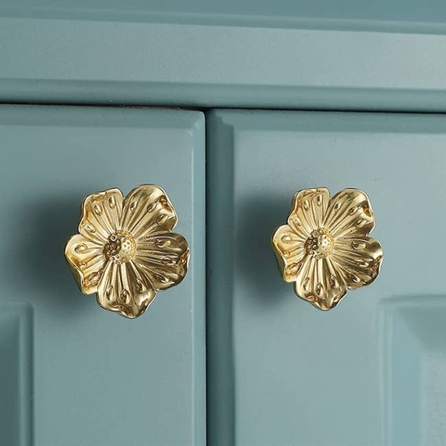 gold floral-shaped door pulls
