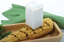 the butter holder on a corn cob