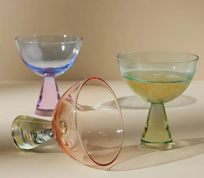 three colorful coupe glasses