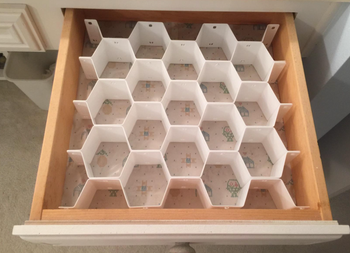 reviewer photo of the honeycomb drawer inside of a dresser drawer