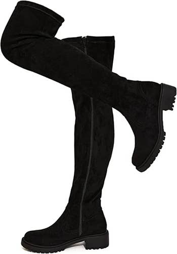 a pair of black over-the-knee boots
