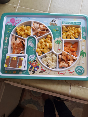 reviewer image of the maze plated filled with different kinds of foods