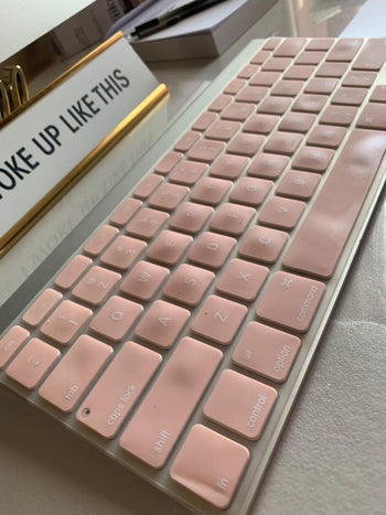 the pink cover on a reviewer's keyboard