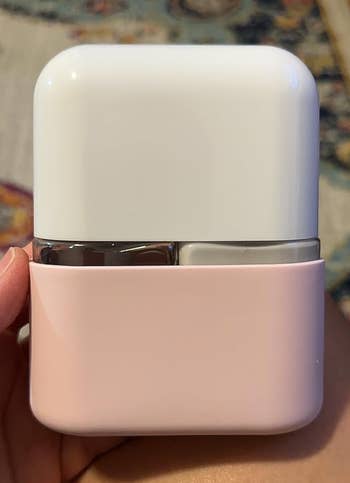 A white cap on top of the dispensers to keep it from leaking