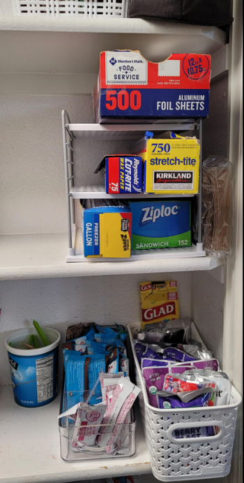ziplock boxes organized neatly on stand