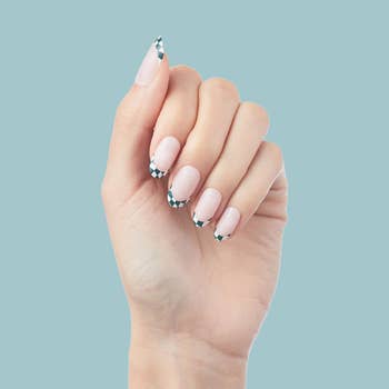 a model wearing the short checkered nails
