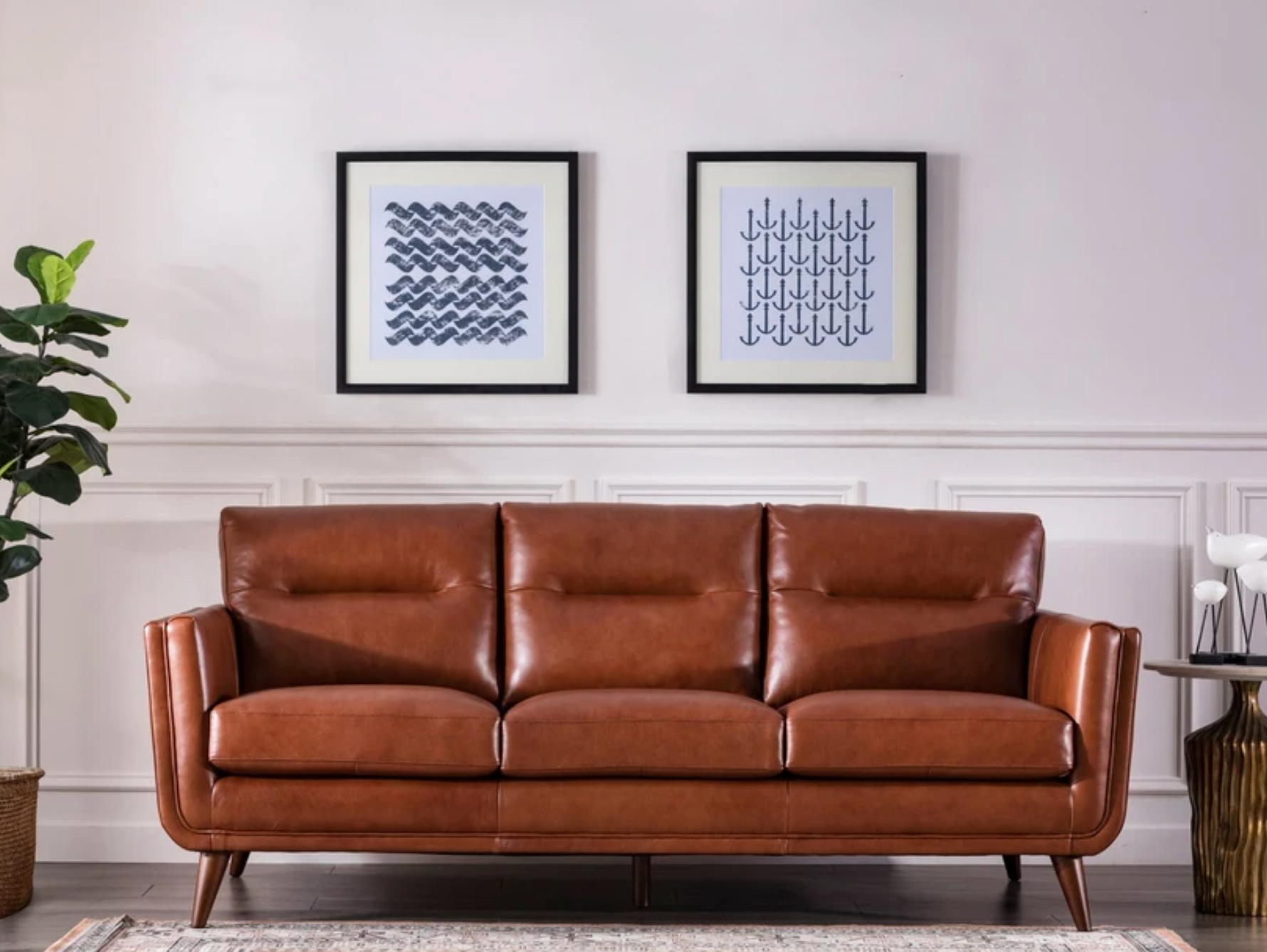 Three seater sofa with angled legs and armrests