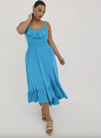 ocean blue sleeveless dress with ruffle detail