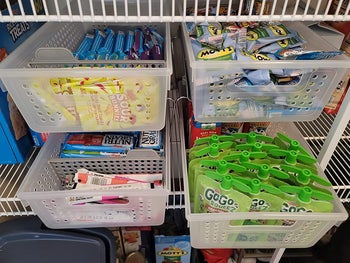 reviewer photo of slide-out drawers full of snacks