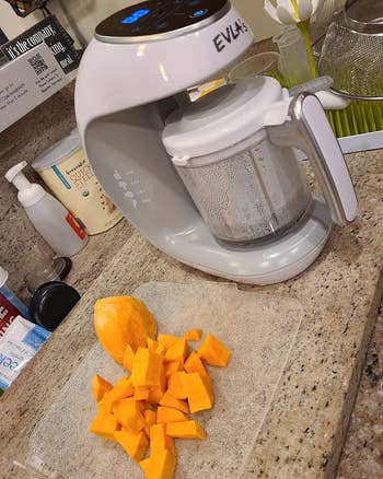 reviewers baby food blender next to cut up sweet potatoes