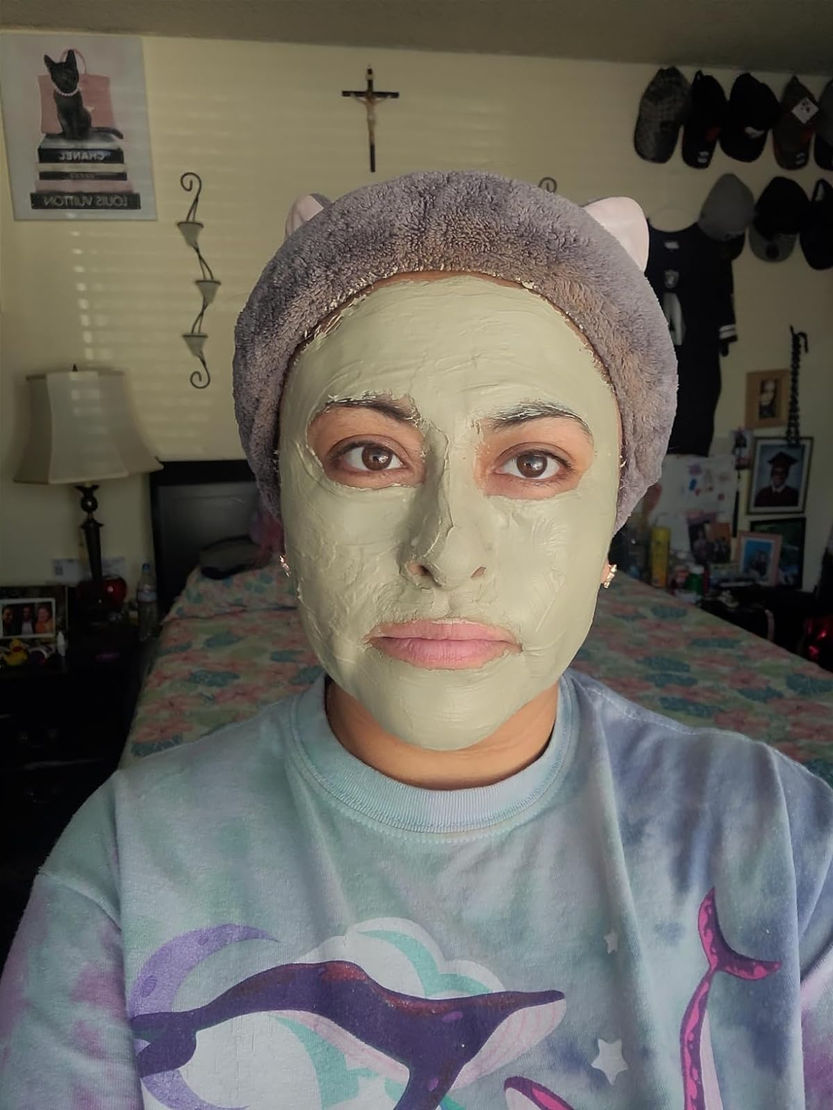 reviewer wearing the mask on their face