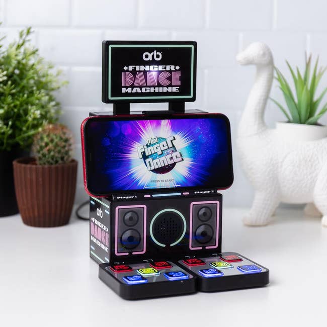 a tiny version of the classic DDR game meant to be played with your fingers