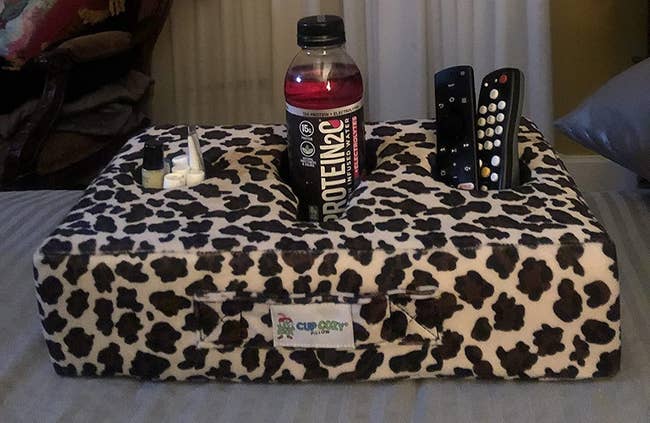 a cheetah print cup cozy pillow