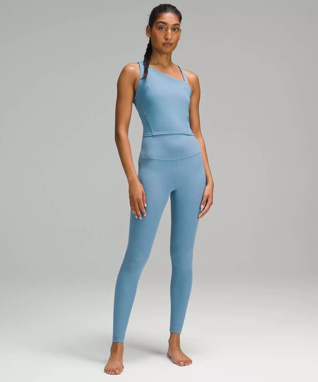 model wearing the utlility blue leggings