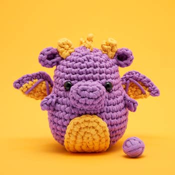 purple and orange crochet dragon