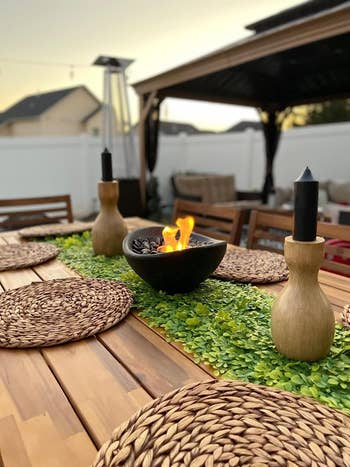 mini fire pit on reviewer's outdoor table