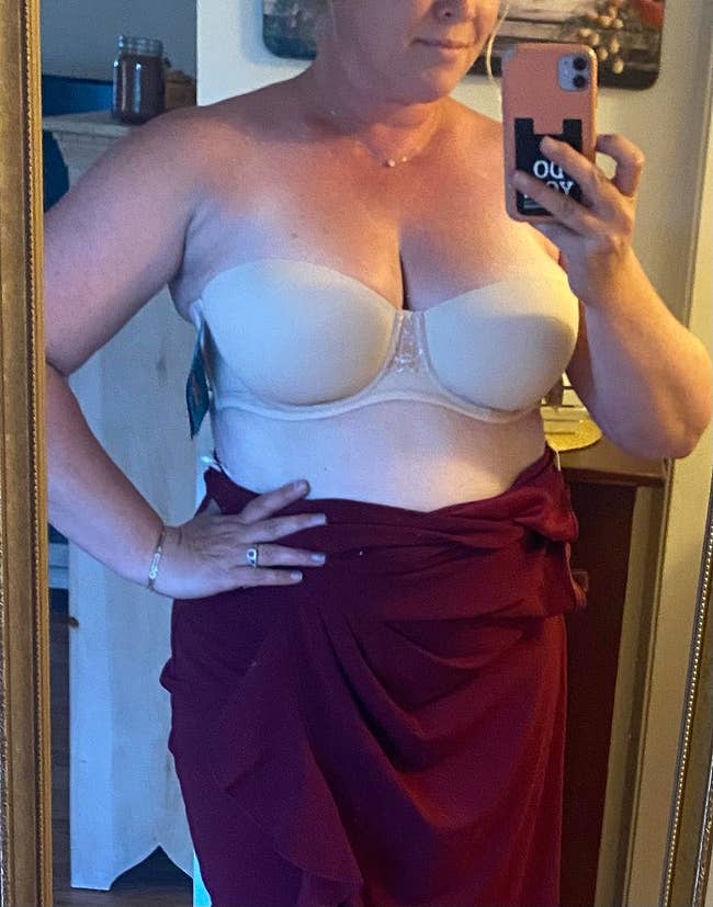 A reviewer wearing the strapless bra