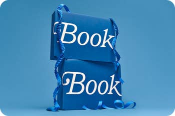 Two blue gift boxes labeled 