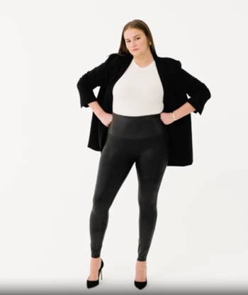 Model in black high waist faux leather leggings 