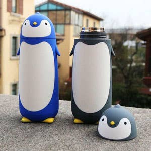 two penguin water bottles in blue and black 