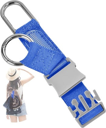 blue strap with a buckle and two hooks for hanging things 
