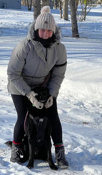 reviewer wearing the overgarment successful grey