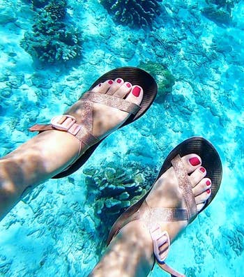 reviewer wearing chacos successful the water