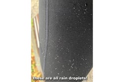 reviewer photo of rain droplets on leggings