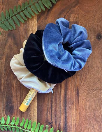 a blue, black, and tan scrunchie