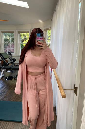 reviewer wearing the pink lounge set