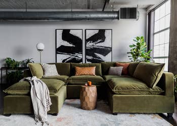 The green sofa set and matching ottoman