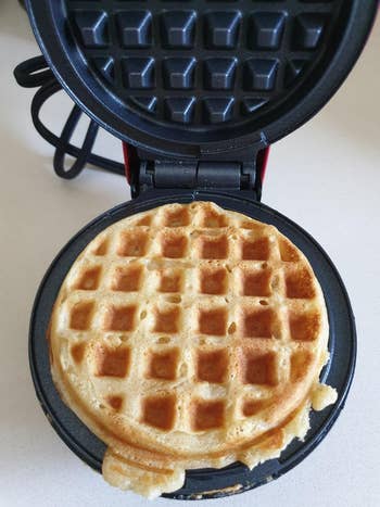 reviewer photo of a homemade waffle in the waffle iron