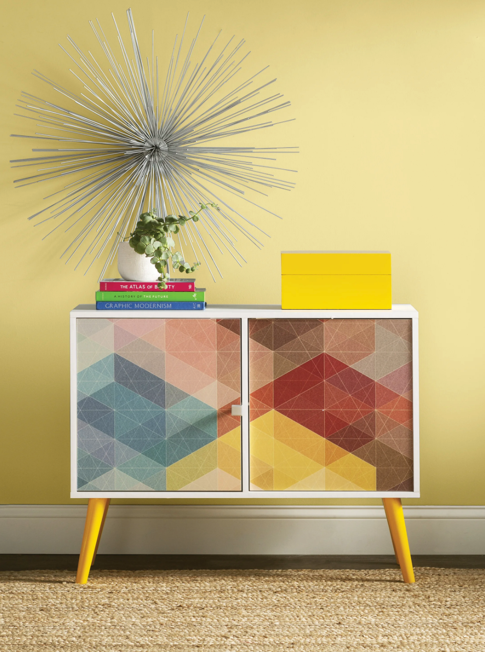 Rectangular accent cabinet with rainbow geometric pattern