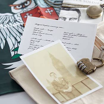 photographs and faux handwritten letters beside other clue items