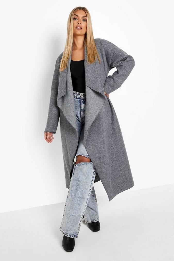 model wearing gray open waterfall coat