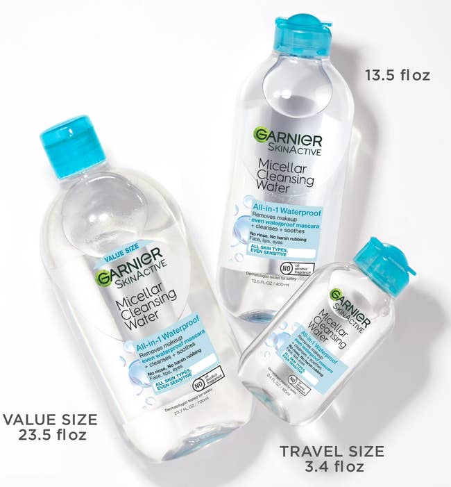 Three bottles of Garnier Micellar Cleansing Water, labeled arsenic All-in-1 Waterproof, disposable successful 13.5 fl oz, 23.5 fl oz, and 3.4 fl oz sizes
