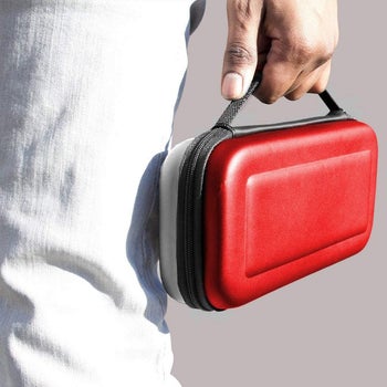a model holding the case in red and white