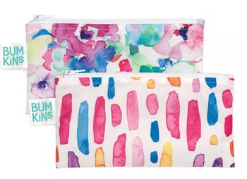 Two of the snack bags with colorful watercolor patterns on them