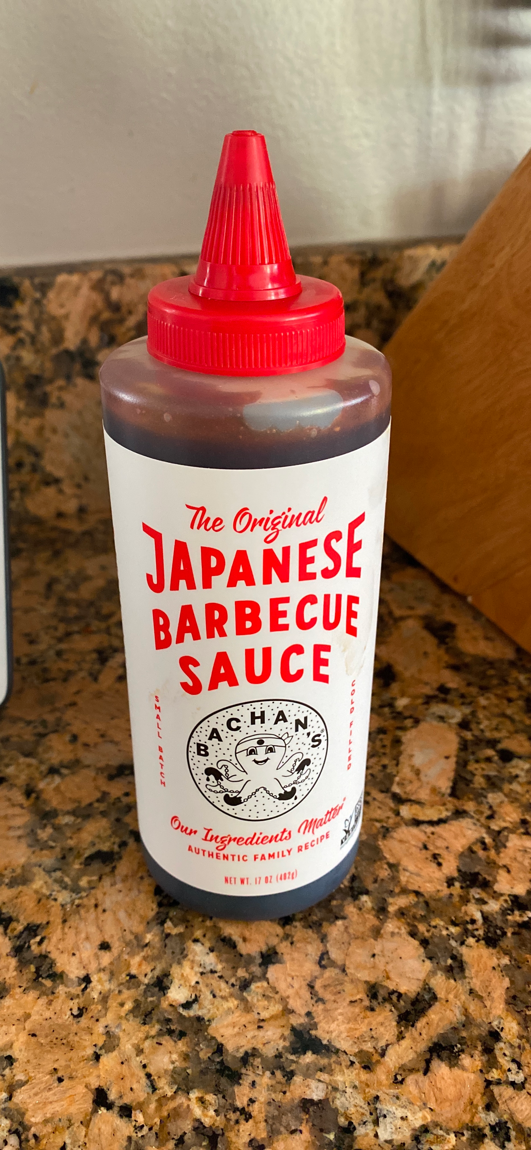 Bottle of Bachan's Original Japanese Barbecue Sauce connected  a room  counter