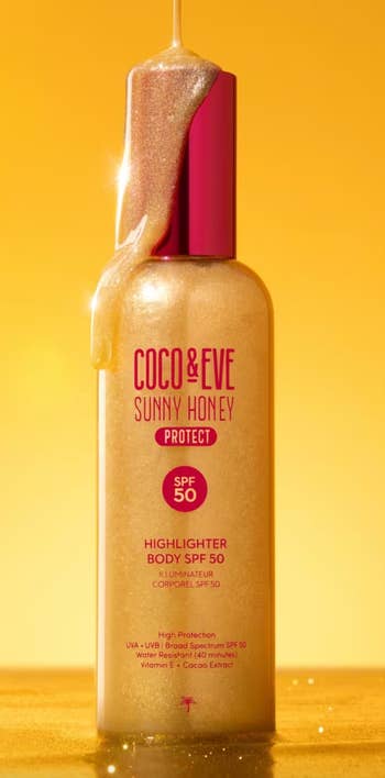 Coco & Eve Sunny Honey Highlighter Body SPF 50 vessel  with shimmering liquid dripping from the top