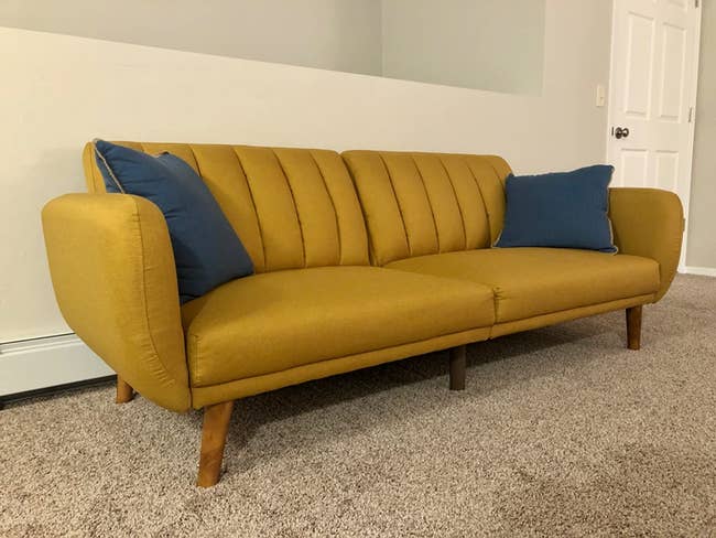 reviewer image of the mustard futon 