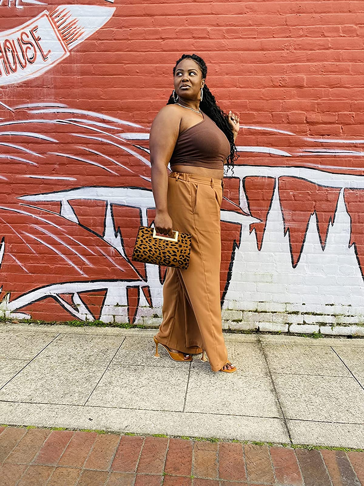 a reviewer wearing the pants in beige