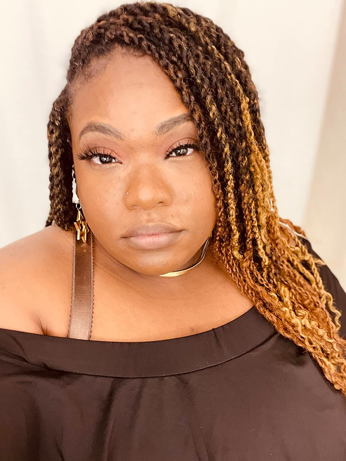 reviewer showing smooth looking makeup with the primer on