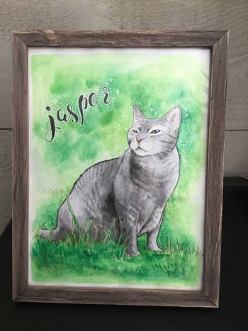 framed art of a gray cat named Jasper