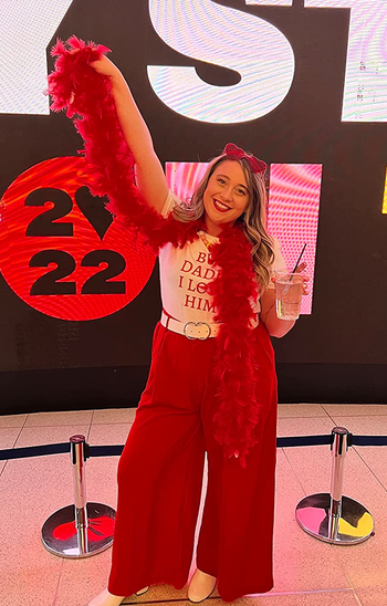 a reviewer wearing the pants in red