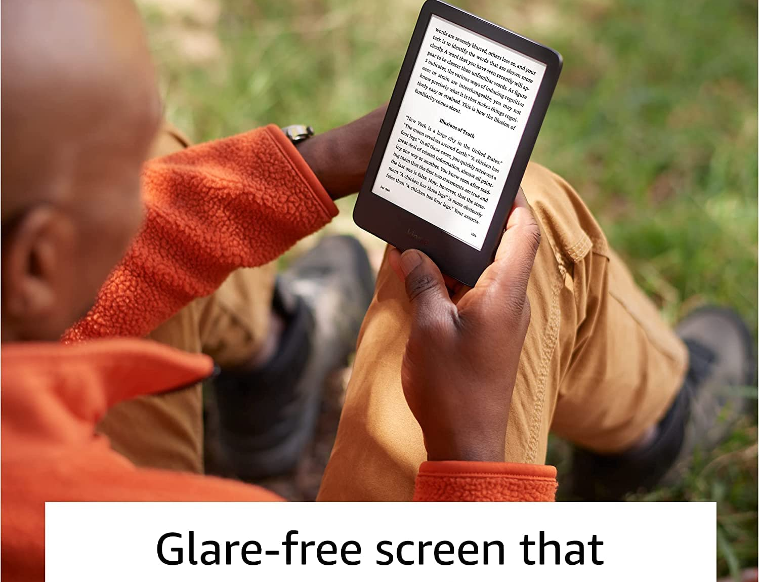 A model holding the black Kindle