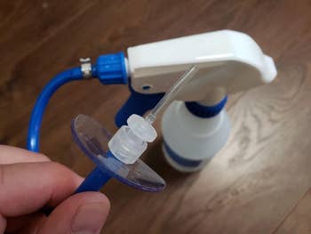 reviewer's bottle with attachment to go in your ear
