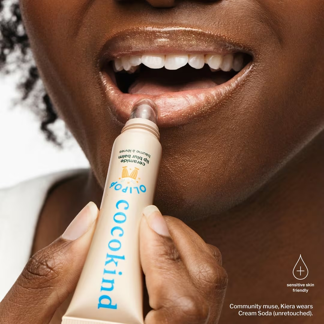 A idiosyncratic   applies Cocokind articulator  balm labeled for delicate  tegument  and described arsenic  untinted