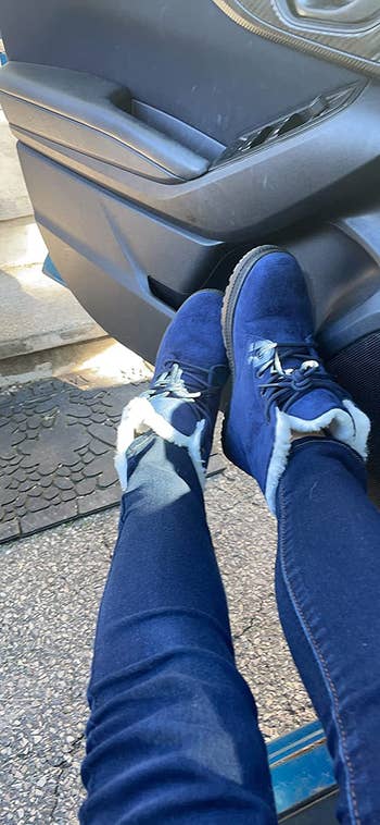 reviewer wearing the boots successful  blue
