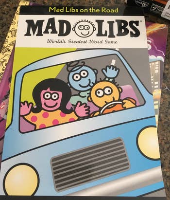 Mad Libs on the Road book cover, featuring a cartoon family of three